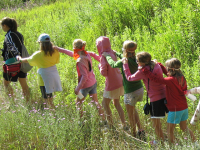 blind childrfen hiking at camp image